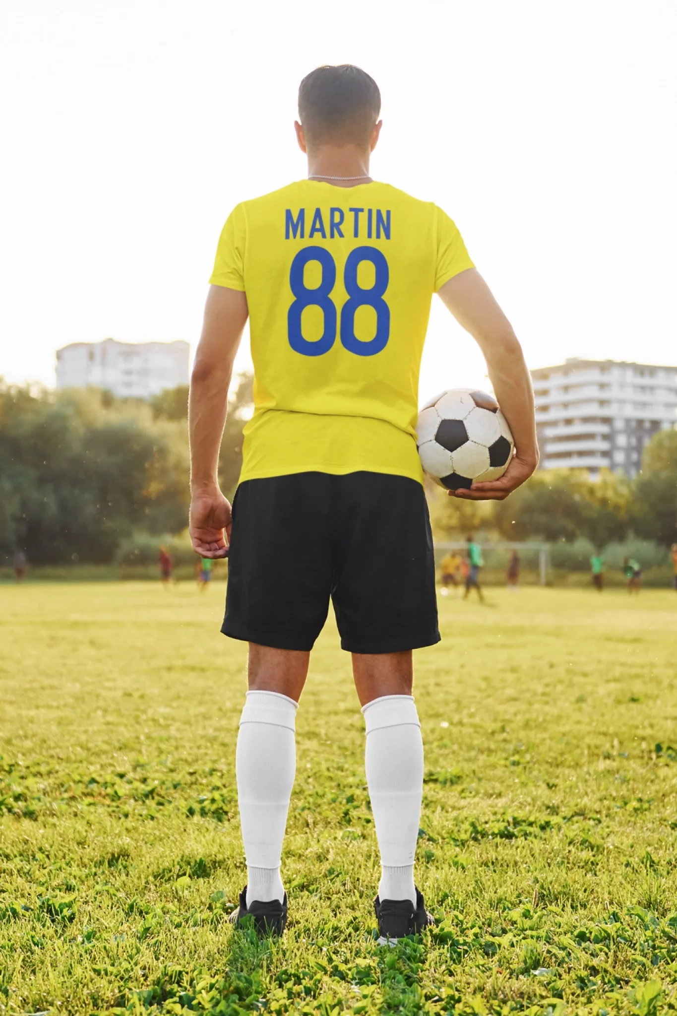 back-view-tee-mockup-of-a-soccer-player-at-a-field-m16913-r-el2 (1)