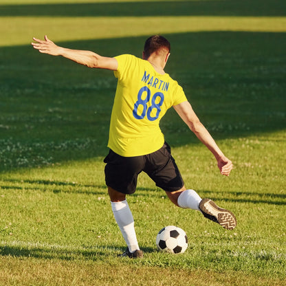 back-view-t-shirt-mockup-of-a-soccer-player-kicking-a-ball-m16843-r-el2