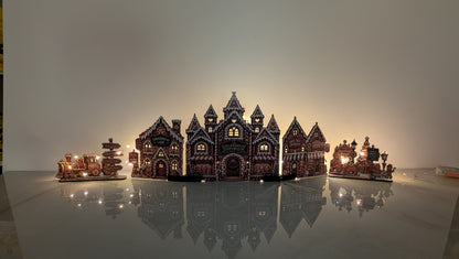 Gingerbread Story Street julby – LED-förberedd pepparkaksby, upp till 72 cm
