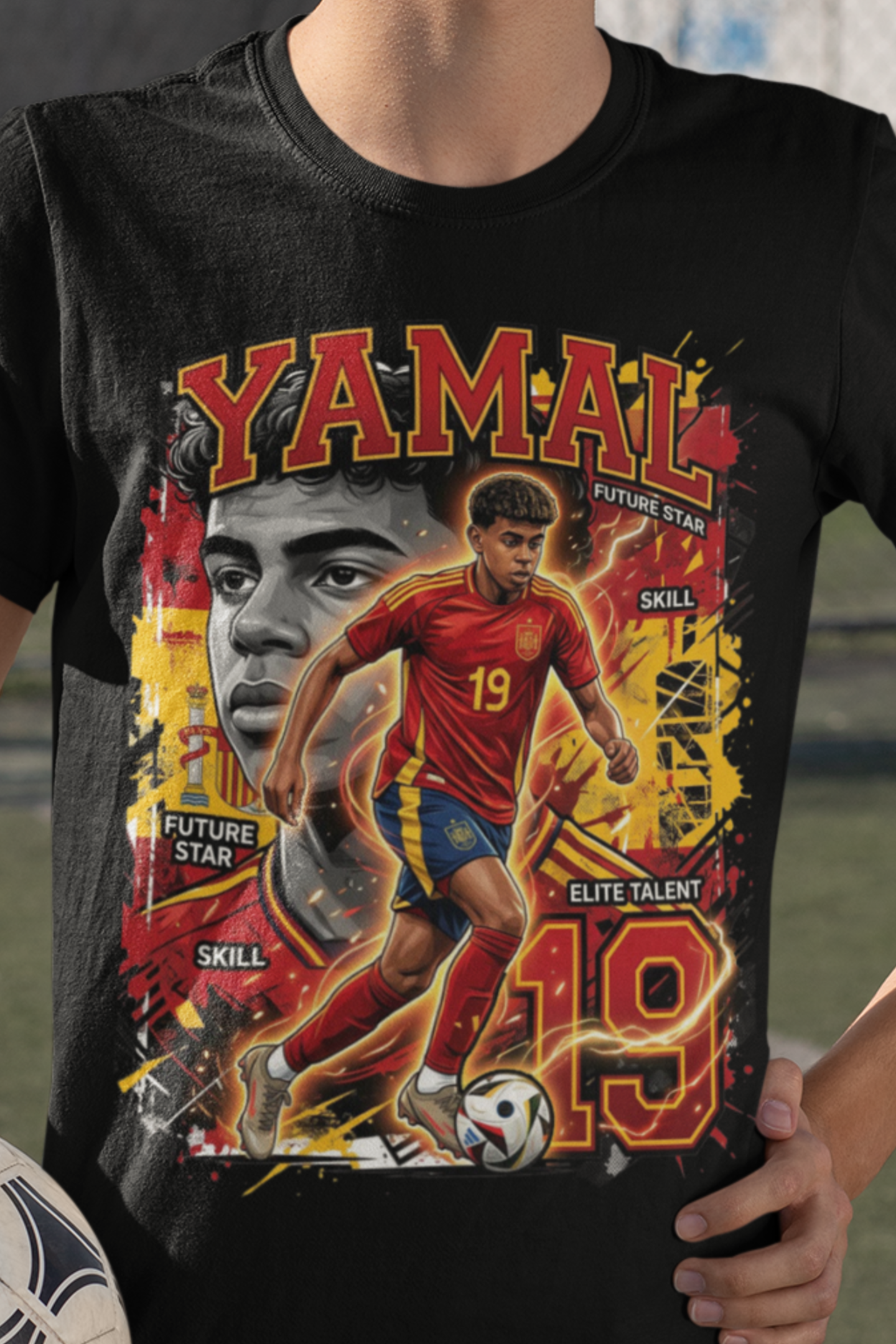 A close-up of a person wearing a black graphic t-shirt featuring a soccer player illustration labeled 'YAMAL' with the number 19 and the words 'FUTURE STAR' and 'ELITE TALENT'.