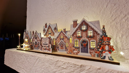 pepparkaksbyscen Placera LED-lampor för upplysta fönster pepparkaka